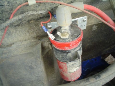 1981 Ford Bronco - the brown and orange wire go to the pos and neg of the coil. The green wire of your tach can go to the tach output on the ignition.