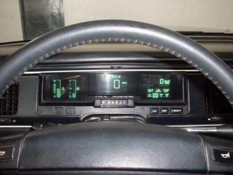1992 Mercury Grand Marquis - The digital dashboard of a 1992 Mercury Grand Marquis displays speed, fuel, and other vehicle information.