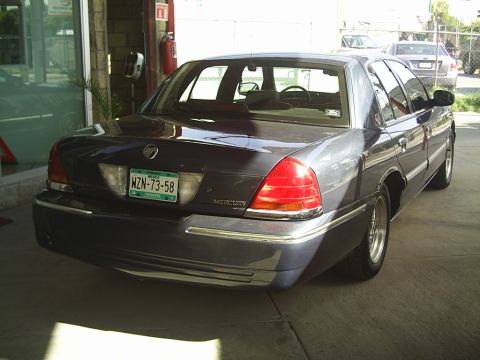 1992 Mercury Grand Marquis - Rear view of a dark blue sedan with a Mexican license plate.