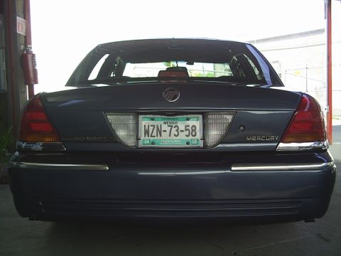 1992 Mercury Grand Marquis - The rear of a Mercury Grand Marquis is shown, its taillights and license plate.