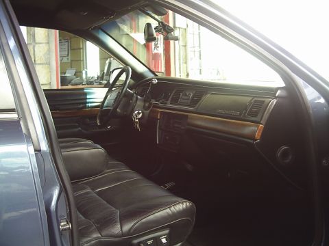 1992 Mercury Grand Marquis - Interior view of a 1992 Mercury Grand Marquis, highlighting its leather seats and dashboard details.