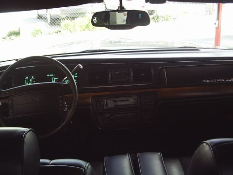 1992 Mercury Grand Marquis - Interior view of a 1992 Mercury Grand Marquis, showing the dashboard and seats.