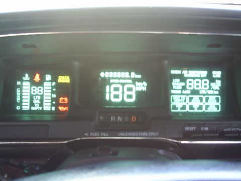 1992 Mercury Grand Marquis - The digital dashboard displays speed, fuel, and various warning lights.