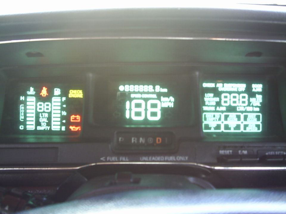 Digital dashboard showing 188 mph and fuel levels