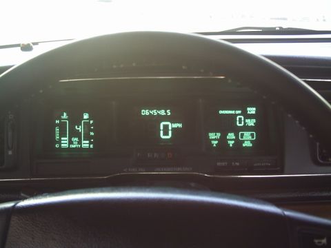 1992 Mercury Grand Marquis - Digital dashboard of a 1992 Mercury Grand Marquis displays speed, odometer, fuel, and trip information.