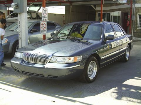 1992 Mercury Grand Marquis - This sedan's body style suggests a model year around 2000, not 1992.