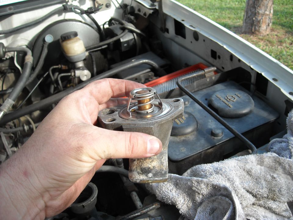 When putting the new thermostat back in the housing, make sure you put the correct side in.
If it is reversed, the truck will run hot.