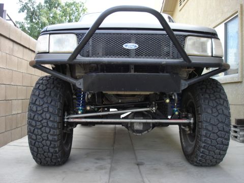 1997 Ford Ranger - This 1997 Ford Ranger features a custom front bumper, bull bar, and aggressive off-road tires, its modified front end.