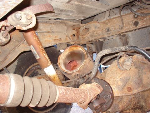 1993 Ford Bronco - Midas did such a crappy job of hanging this muffler that it cracked & fell off about a year later (6 years ago). I used coathangers to hold…