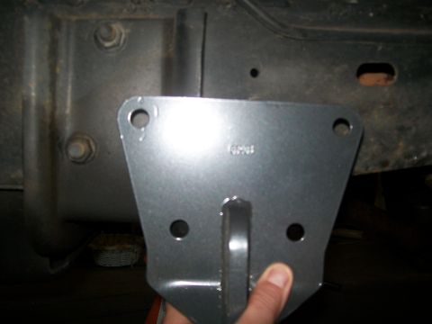 1995 Ford Bronco - Me holding the bracket where it SHOULD go.