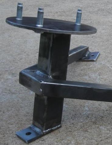 1995 Ford F-150 - Custom fabricated spare tire mount with three wheel studs, likely for an off-road vehicle.