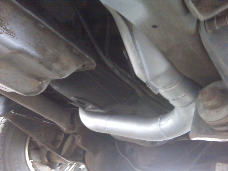 Underneath view of a 1994 Ford F-150 exhaust pipe