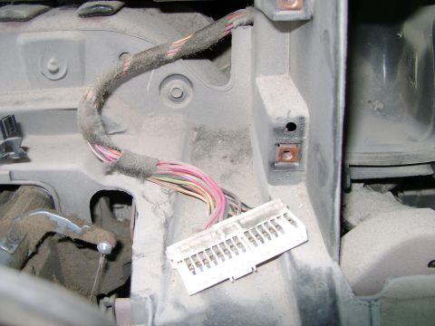 1998 Ford Crown Victoria - Close-up of a wiring harness and connector, likely part of the dashboard or instrument panel assembly.