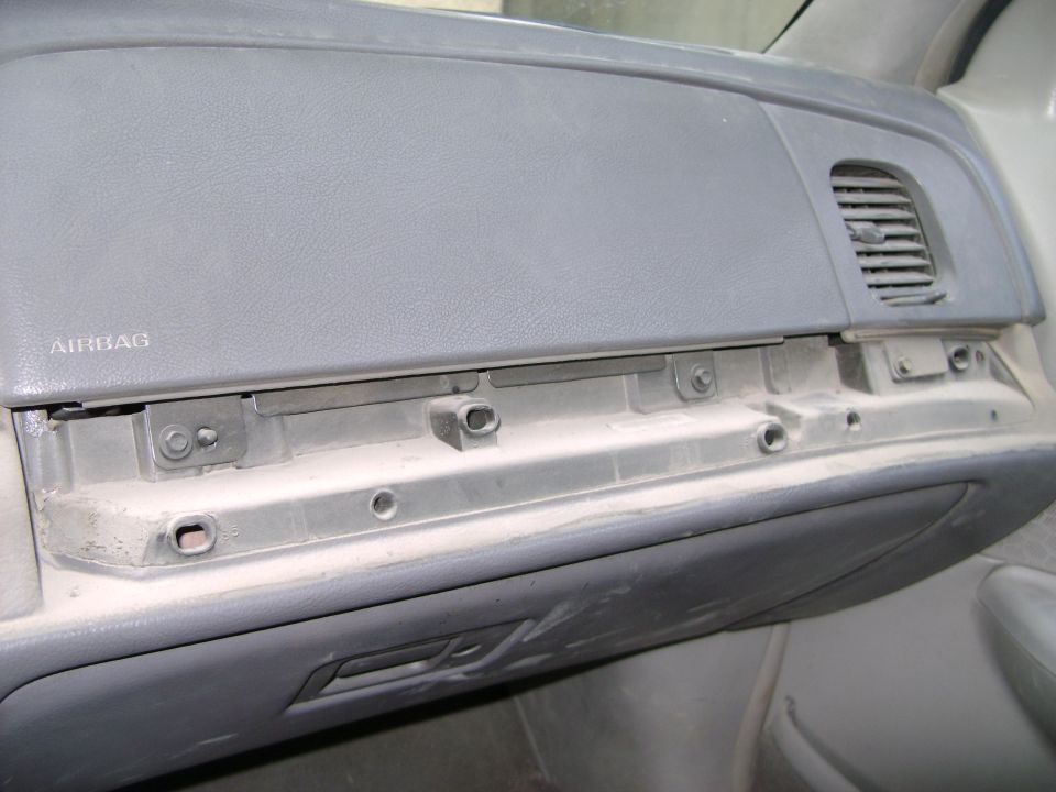 1998 Ford Crown Victoria dashboard interior showing the airbag panel and vent