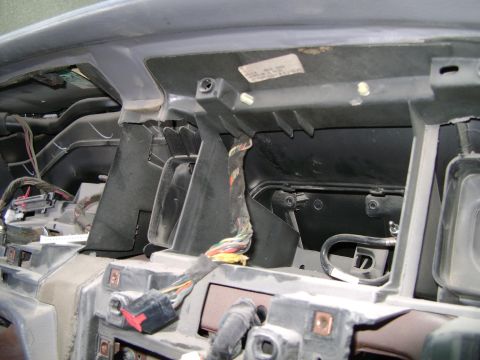 1998 Ford Crown Victoria - Interior view of a disassembled dashboard, revealing wiring and structural elements.
