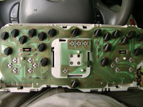 1998 Ford Crown Victoria - Close-up of a vehicle's instrument cluster circuit board, showing its internal components and wiring.