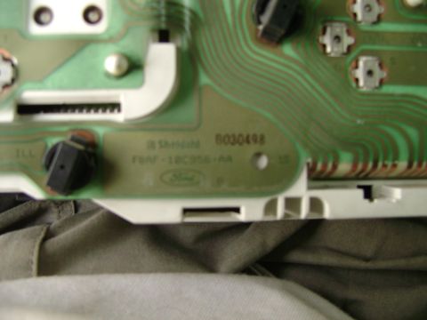 1998 Ford Crown Victoria - Circuit board from a Ford instrument cluster, showing part numbers and the Ford logo.