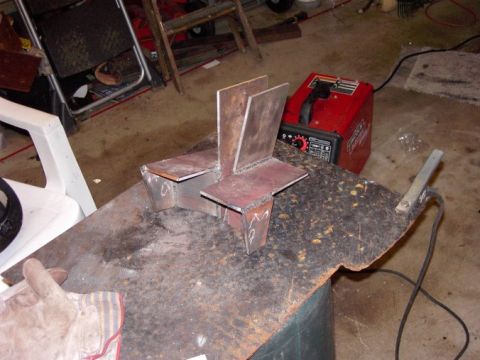 1980 Ford Bronco - Metal fabrication project in progress with welding equipment nearby.
