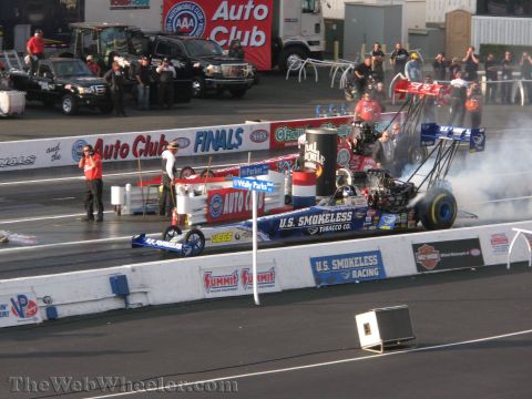 1968 Ford Mustang - Drag racing cars prepare for a run at the Auto Club Finals.
