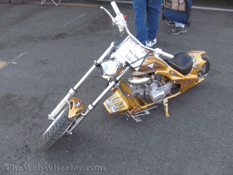 1968 Ford Mustang - Custom chopper motorcycle with flame graphics is parked on asphalt, with a 'For Sale' sign.