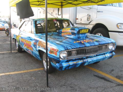 1968 Ford Mustang - This drag car features a distinctive "Nitro Fish" paint scheme and a prominent hood scoop.