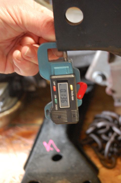 1963 Ford Galaxie - Measuring the thickness of a part with a digital caliper.