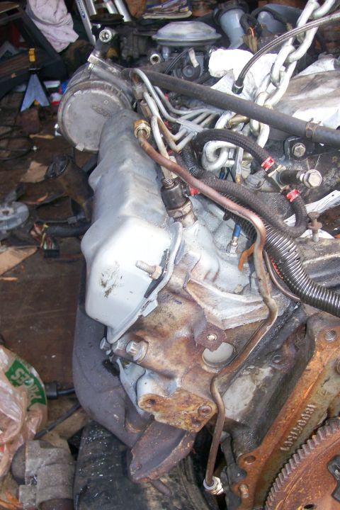 1992 Ford C-350 (Centurion Conversions) - The line coming up the back of the block. I used one of the metal fuel lines for this. It worked great!