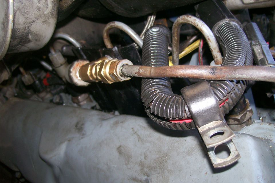 The T-fitting for the oil pressure sending unit and the supply to the turbo.