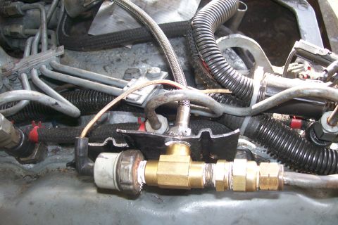 1992 Ford C-350 (Centurion Conversions) - This was another bracket I had to make that came with the kit originally. I hooked up my factory sending unit here and ran my mechanical ga…