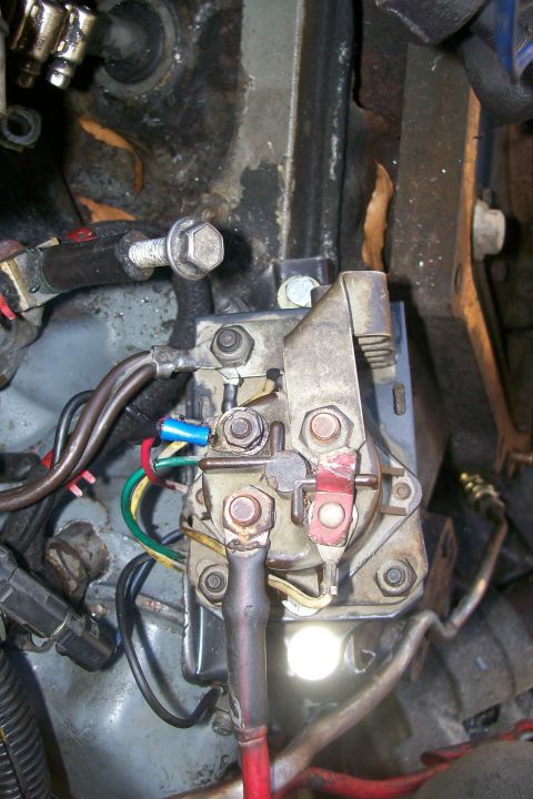 1992 Ford C-350 (Centurion Conversions) - Starter solenoid and associated wiring, likely from an older vehicle's engine bay.