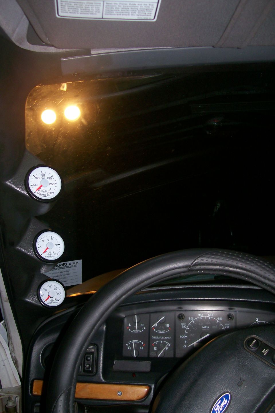 1992 Ford C-350 (Centurion Conversions) dashboard with three aftermarket gauges and stock instrument cluster