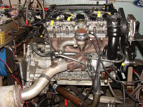 1996 Jeep Grand Cherokee - Close-up view of a complex engine assembly a turbocharger and numerous electrical connections.