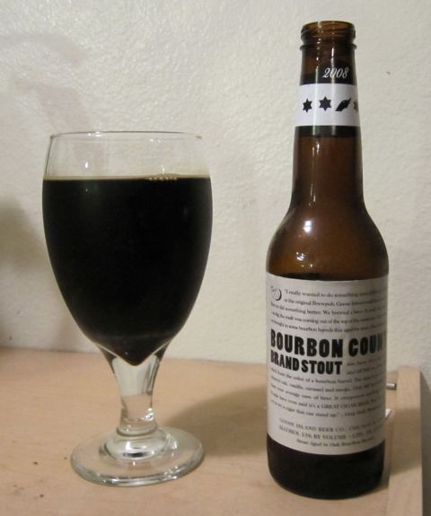 1990 Ford Bronco - A bottle of Goose Island Bourbon County Brand Stout from 2008 sits next to a full glass of the dark beer.