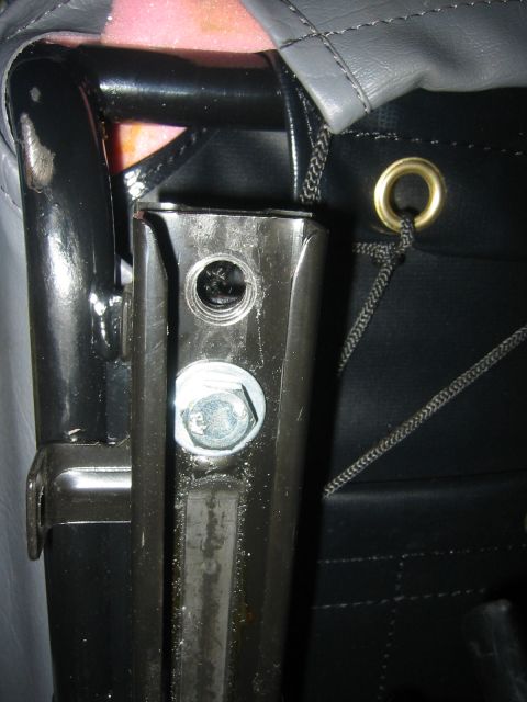 1995 Ford Bronco - Detail of a seat frame assembly, showing metal components and upholstery attachment points.