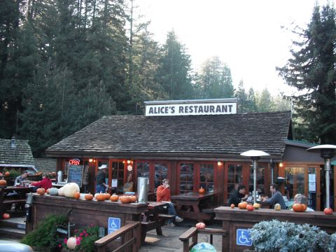 1991 Ford Bronco - Alice's Restaurant is decorated with pumpkins for fall, with patrons dining outside.