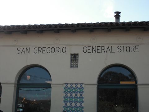 1991 Ford Bronco - The facade of the San Gregorio General Store features arched windows and decorative tilework.