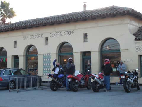 1991 Ford Bronco - Several motorcycles and riders are parked in front of the San Gregorio General Store.