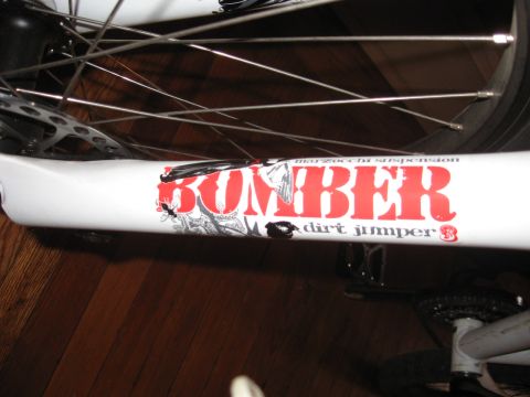 1992 Ford Ranger - Close-up of a white Marzocchi Bomber dirt jumper suspension fork, red lettering and graphics.