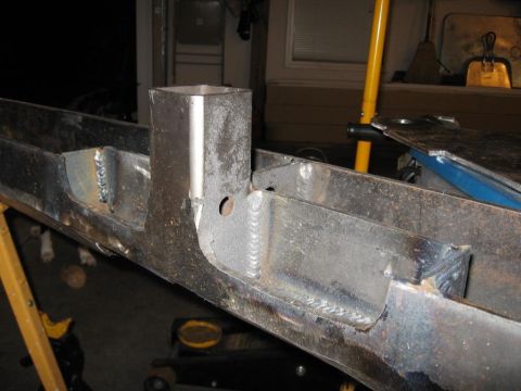 1995 Ford F-150 - This is a close-up view of a welded metal frame section, possibly part of a custom build or repair.