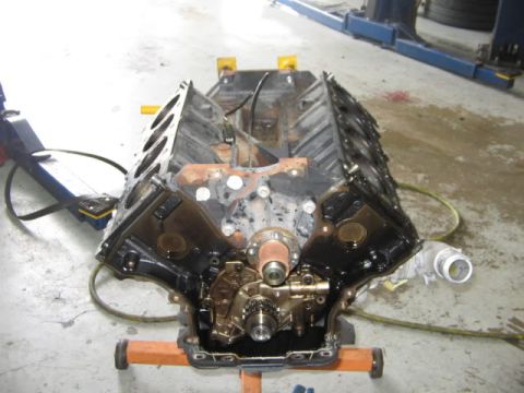 2007 Ford Mustang - Engine block assembly on a stand in a workshop.