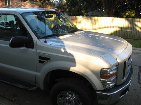 2008 Ford F-250 - Front quarter view of a silver 2008 Ford F-250 Super Duty truck parked outdoors.