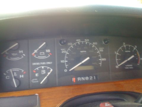 1996 Ford C-350 (Centurion Conversions) - The dashboard displays various gauges, including a speedometer and tachometer, with a clear indication for diesel fuel only.