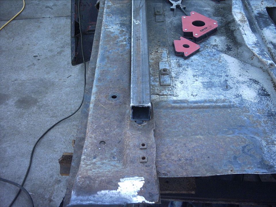 Frame crossmember repair with welding magnets on a bench