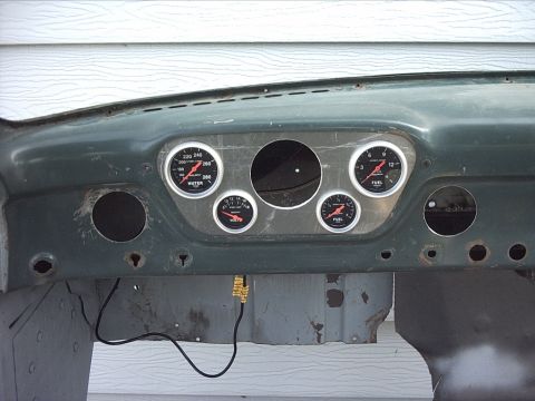 1954 Ford F-100 - 5-17-09: Today I did some more work on the instrument panel. I marked out where I wanted the gauges and drilled some pilot holes then used…