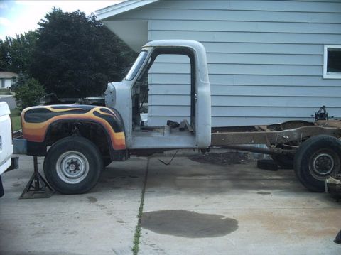 1954 Ford F-100 - 7-09-08: Here's today's progress. Pulled the F600 fender off and dug the Flamed F100 fenders out of the garage. I bolted them to the cab an…