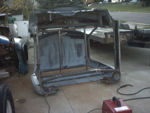 1954 Ford F-100 - 10-25-08: Today I pulled the windshield out of the cab and tipped the cab on it's back panel. Then I finished the welding on the rockers an…
