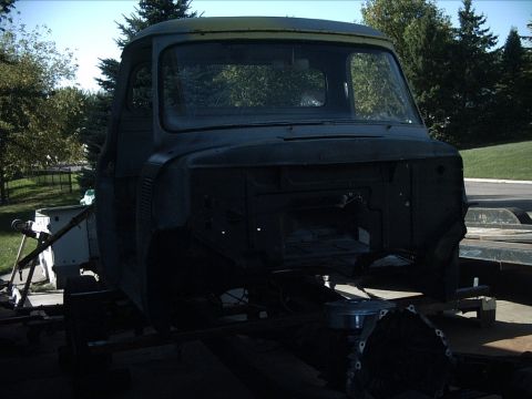 1954 Ford F-100 - 10-02-08: Today I started by lifting the cab and slid some 2"x2" steel tubes under the rockers to get the floor off the frame rails.