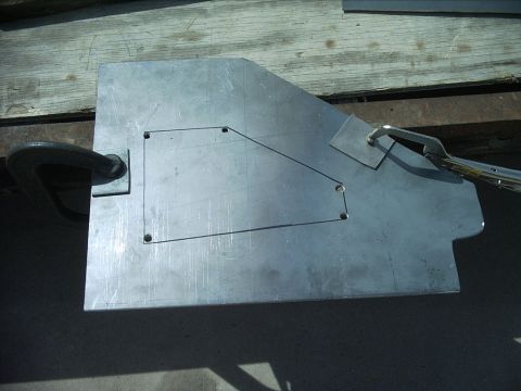 1954 Ford F-100 - 4-16-09: Today I did a little more grinding to get to get the plate to fit better. I also figured out what size access hole I wanted in the…