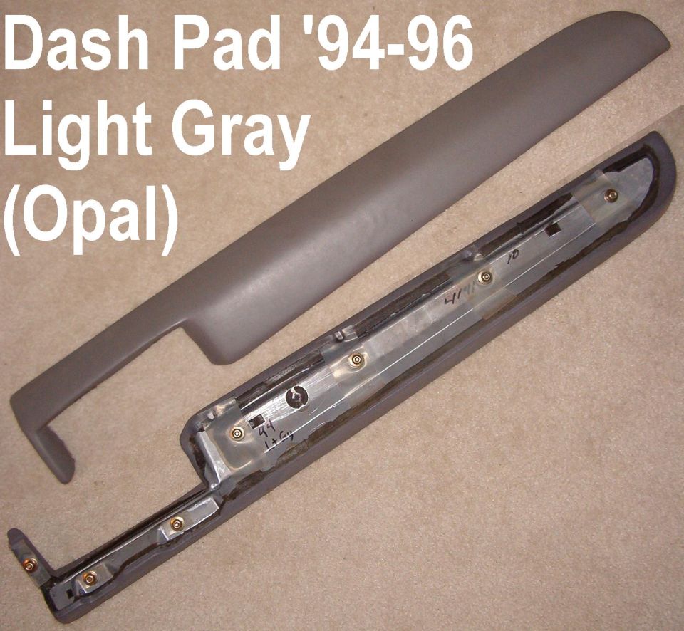 Light gray Opal dashboard pad with bracket, labeled 1994-96