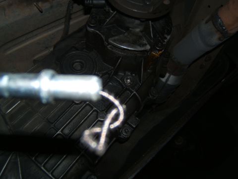 1988 Ford Bronco - Underside view of a vehicle's transfer case and associated components.
